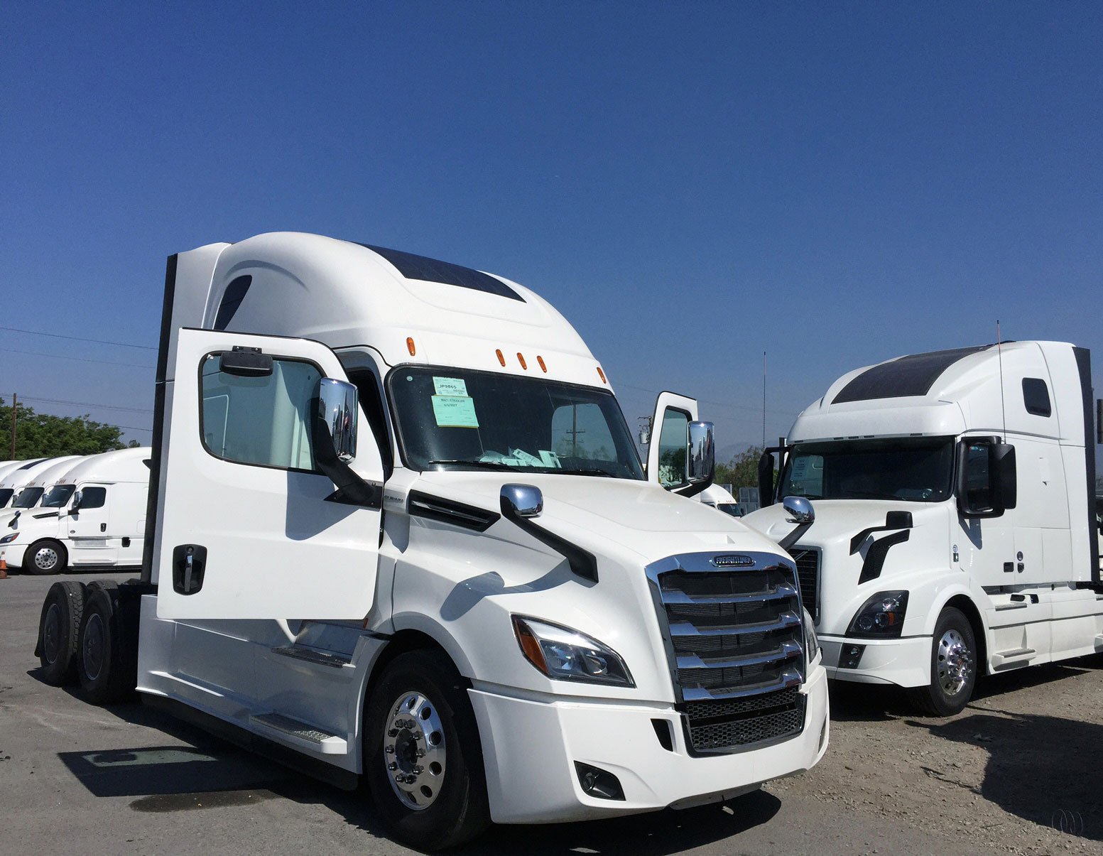Solar-powered white truck fleet with multiple Blue Sky Energy MPPT charge controllers on same system, reporting data about system performance
